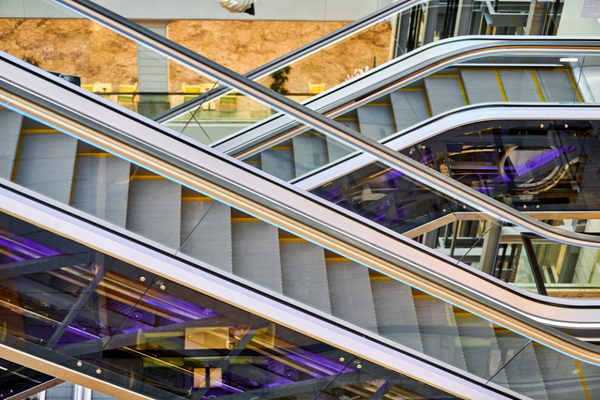 Crisscross escalators